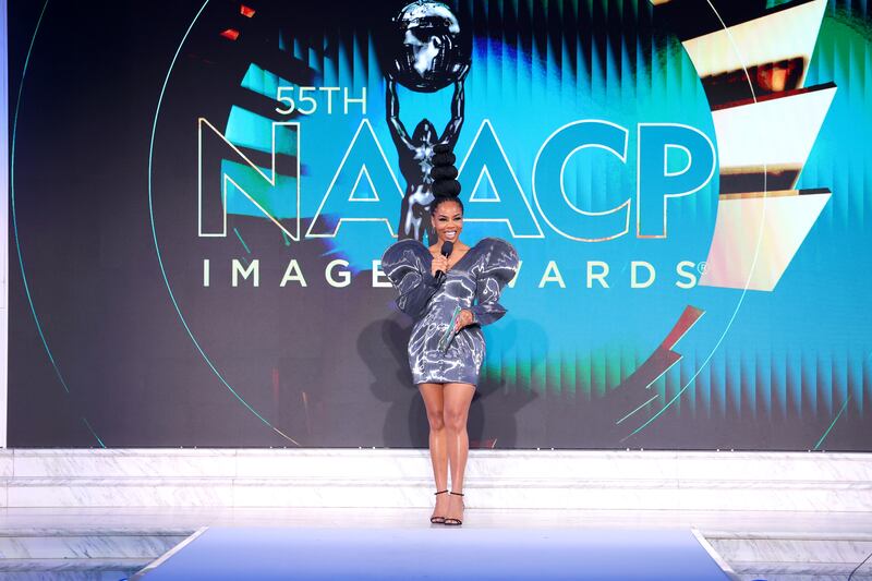 Brandee Evans on stage at the 55th NAACP Awards Fashion Show. Photo Credit: Getty Images for NAACP