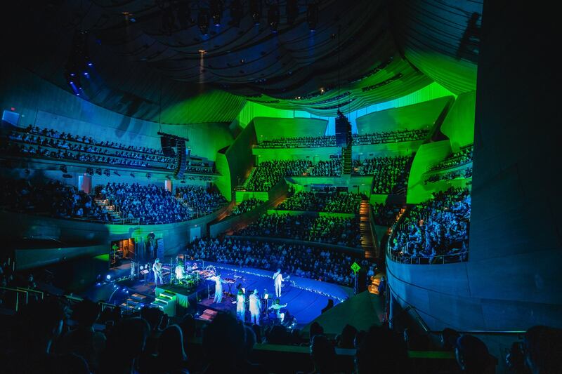 Concert hall filled with a crowd.