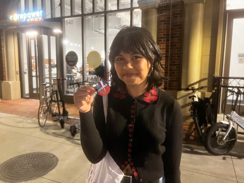 Serrano posing with an "I Voted" sticker.