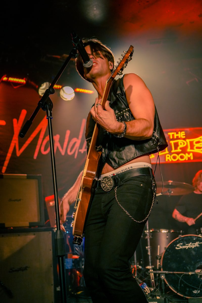 Musician with guitar.