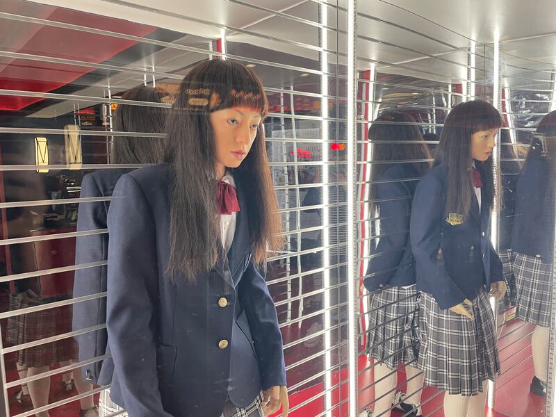 Photo of a mannequin dressed in a school uniform