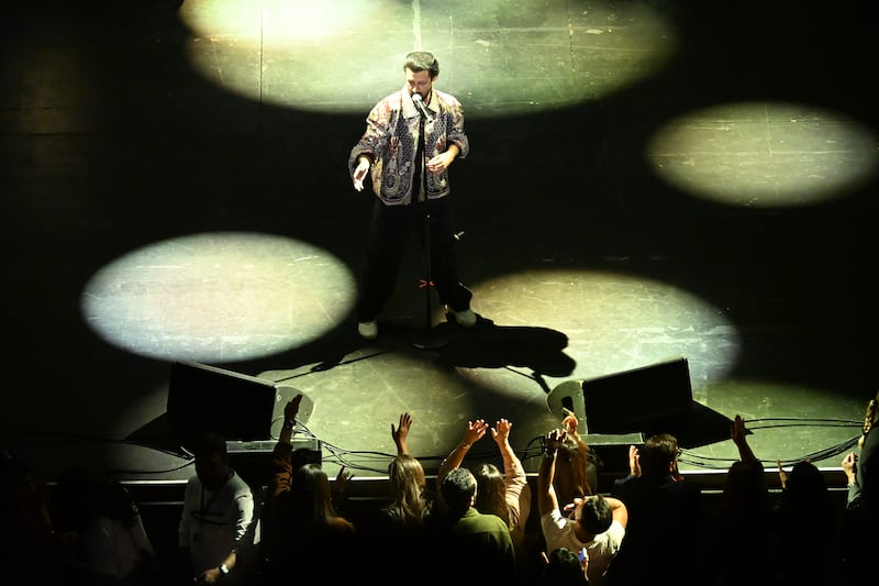 Aslam interacting with his fans from the stage.