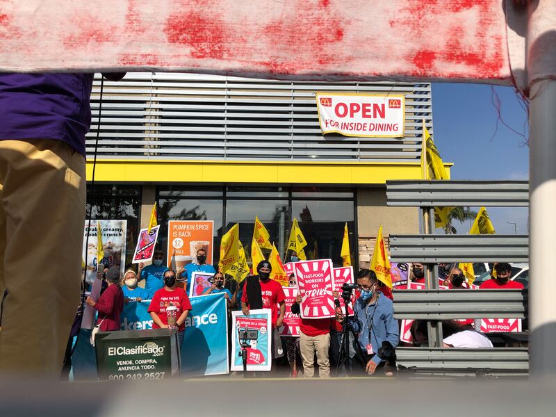 Fast-food employees protest poor working conditions.