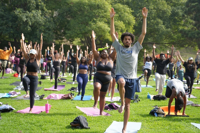 Participants move through a yoga sequence during WalkGood LA × BeyGOOD’s final BreatheGood of the year at Kenneth Hahn Park on November 2.