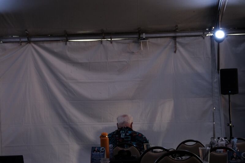 A member of the press prepares for the Republican debate in the press filing room.