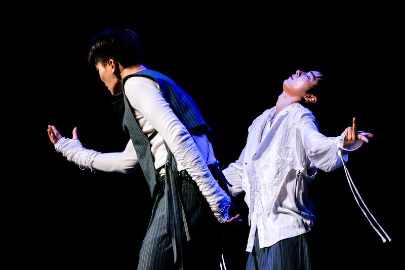 K-pop artists dancing on stage