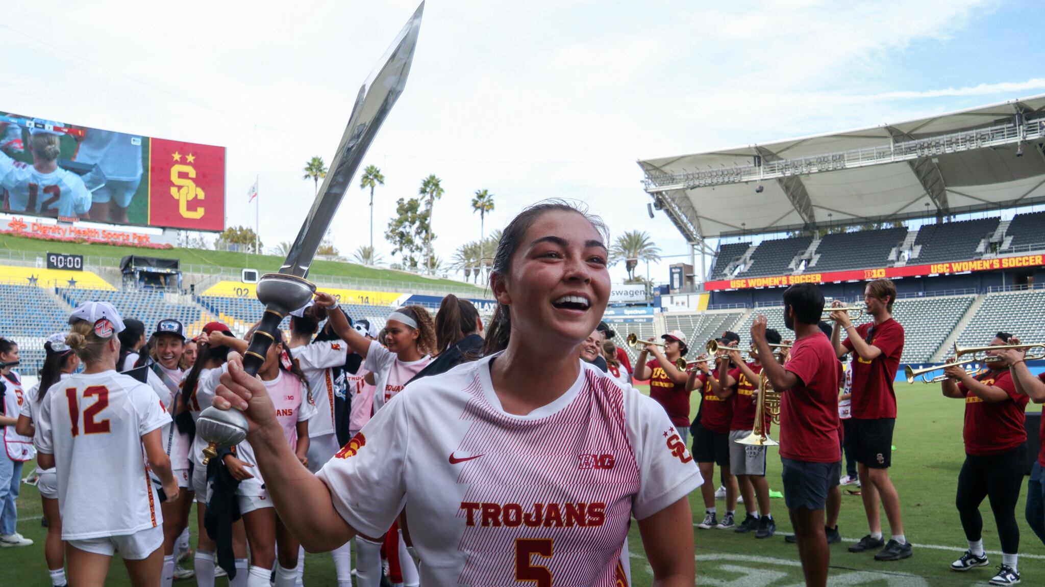 Senior forward Maile Hayes, a transfer from Texas A&M, celebrates the team's 1-0 win over UCLA with the trademark Trojan sword. Hayes scored the match's lone goal.
