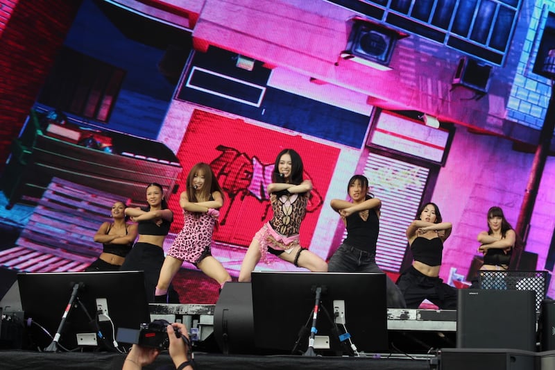 K-pop group performing on stage