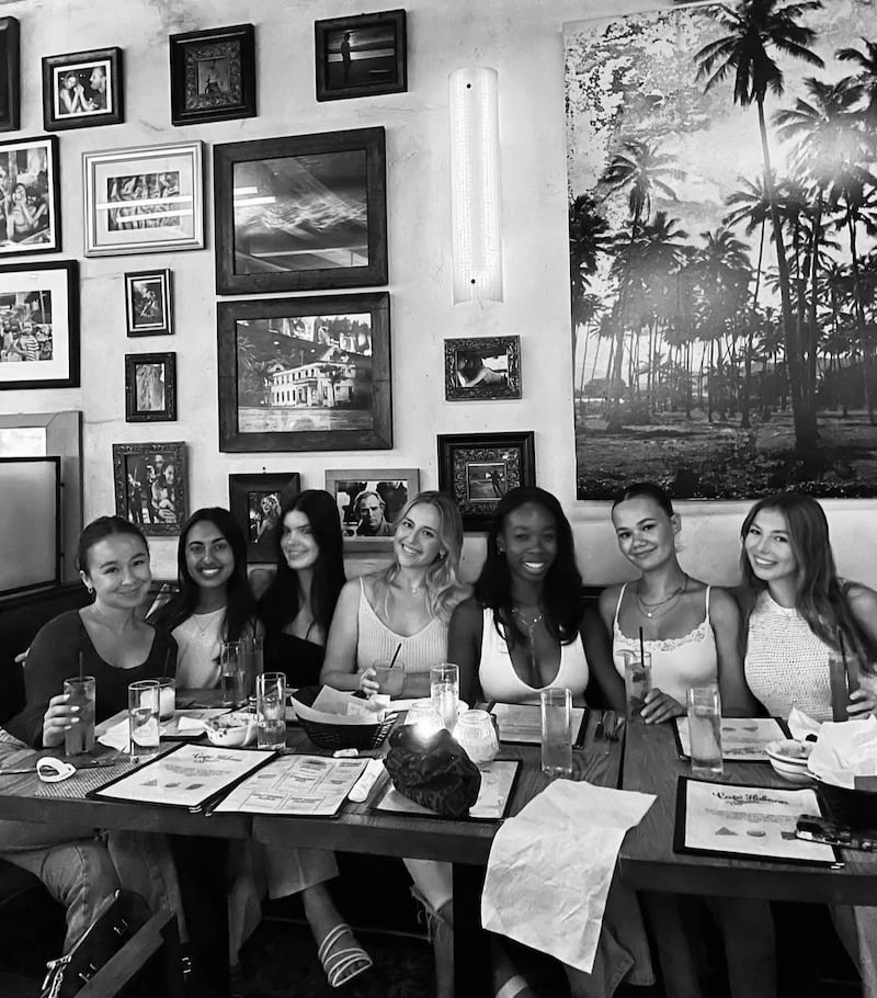Asha Weir (second from left), Niamh Rolston (third from left), Peyton Stewart (fourth from left) and Deslyn Williams (fifth from left) are known as 'Our Girls' among Pepperdine students and Malibu residents. (Photo courtesy of Bridget Thompson)