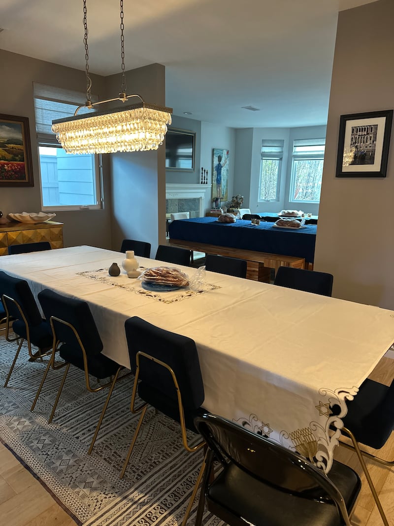 A table with a white tablecloth on it.