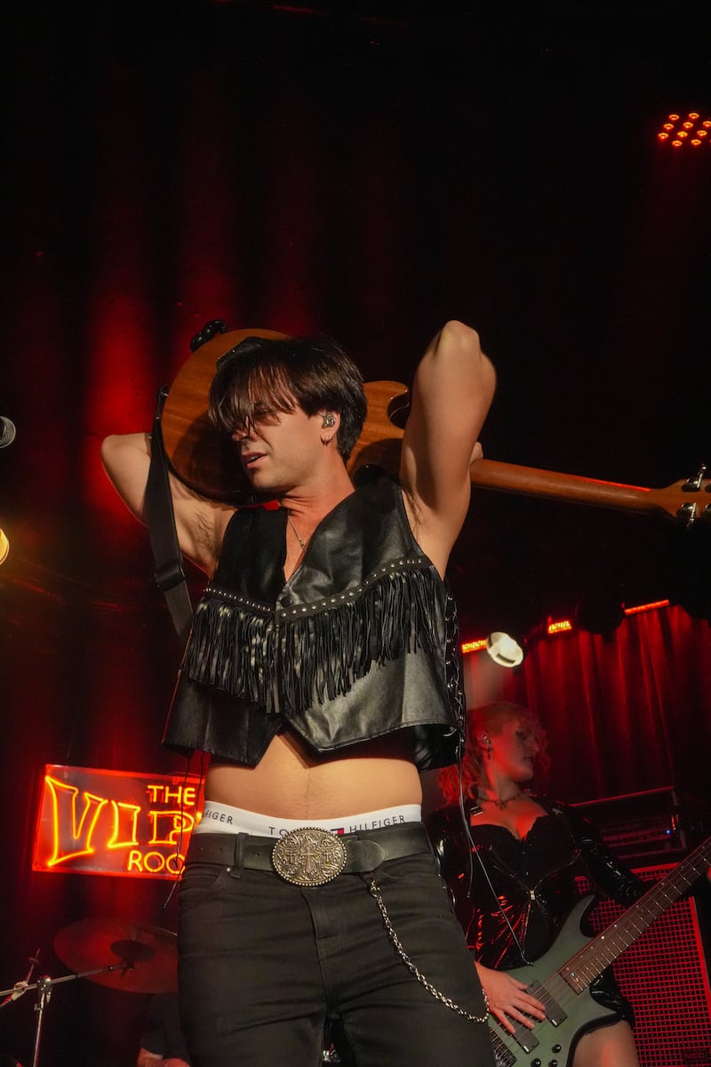 Musician with guitar.