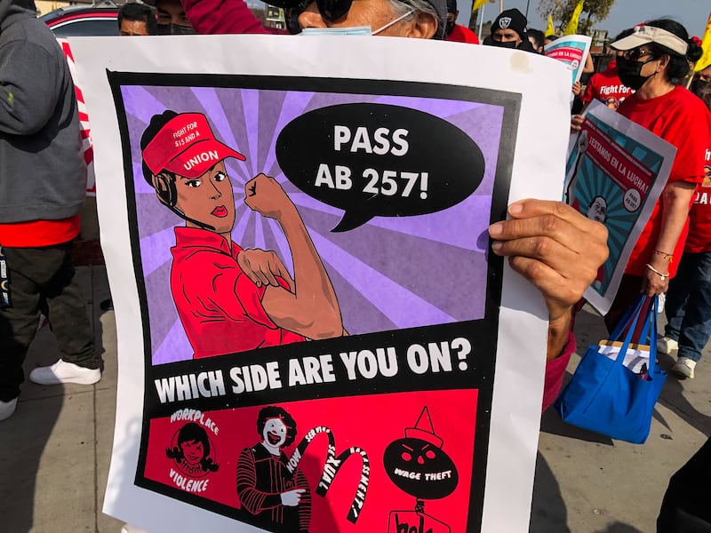 Fast-food employees protest poor working conditions.