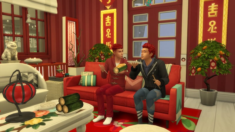 Two characters are on the couch in The Sims