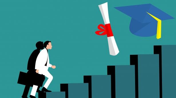 Clip art of person climbing stairs towards icons of a diploma and graduation cap