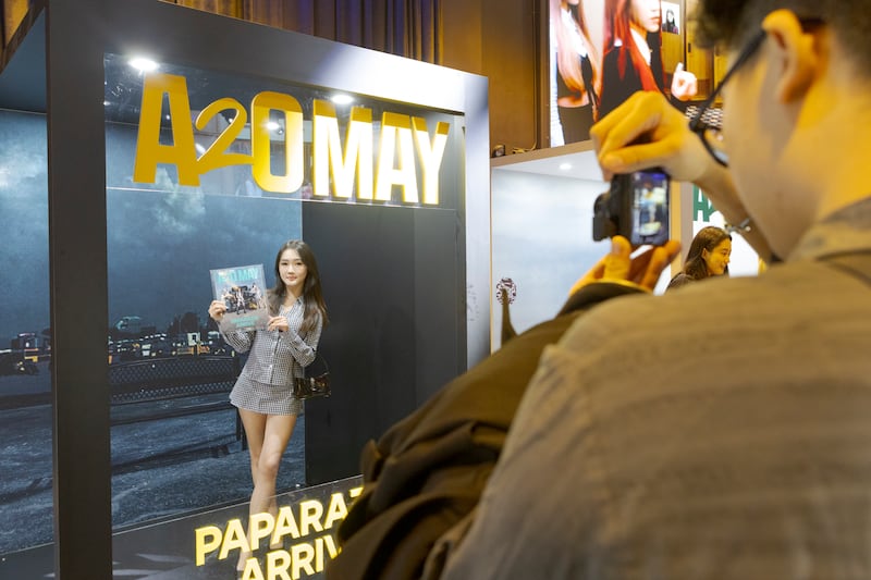 People taking posing and taking photos