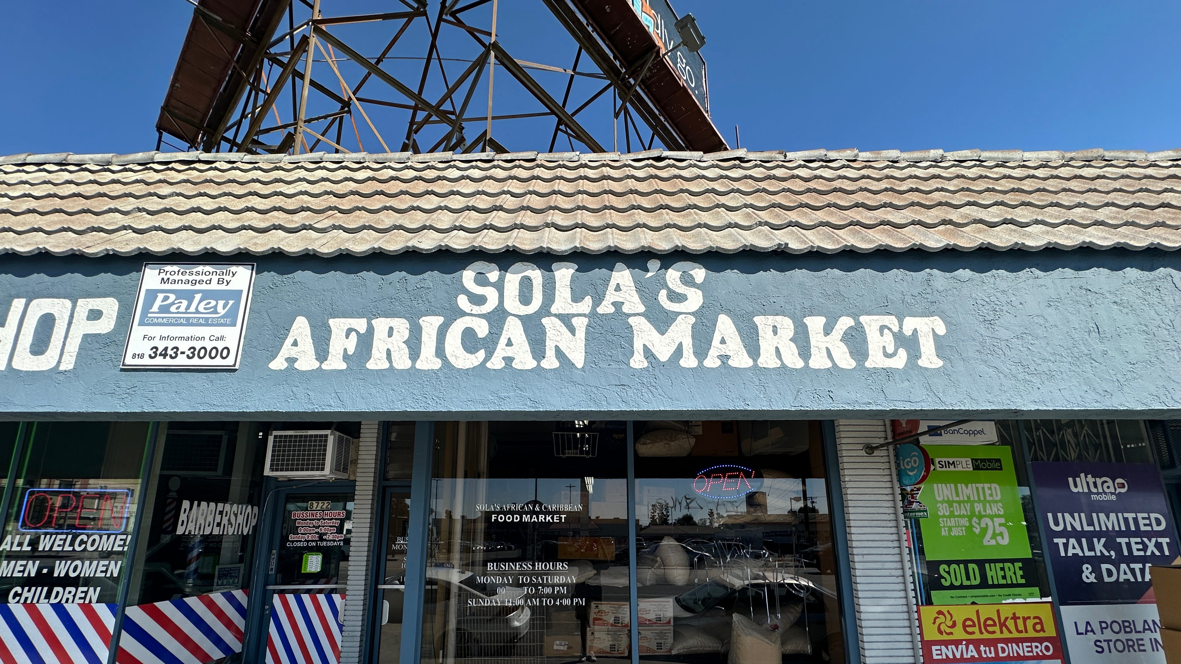 Photo of the blue storefront of Sola's African Market.
