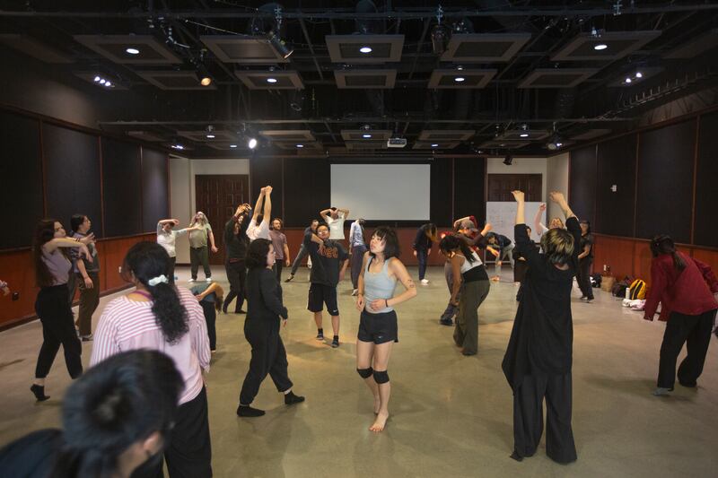 People moving together in a group.