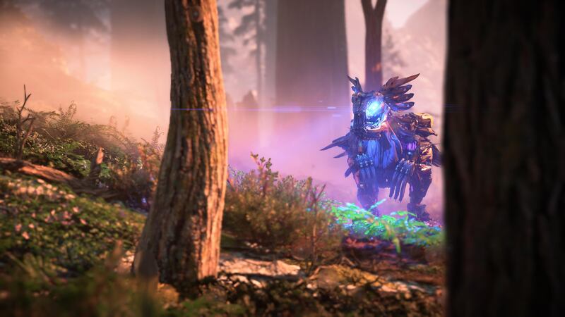 A neon-eyed machine from "Horizon Forbidden West" stalks through the forest.