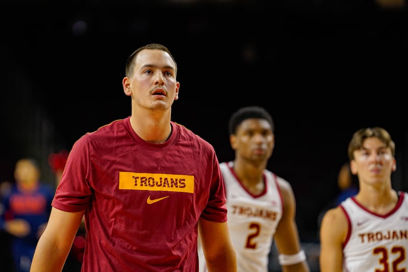 A basketball player stare at the camera