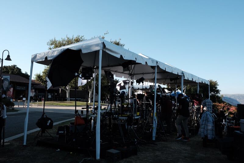 The press prepares for live shoots out front of the Reagan Library.