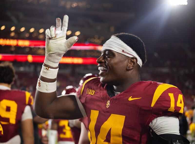 Ta’Mere Robinson celebrates a Trojan win against the Wolverines.
