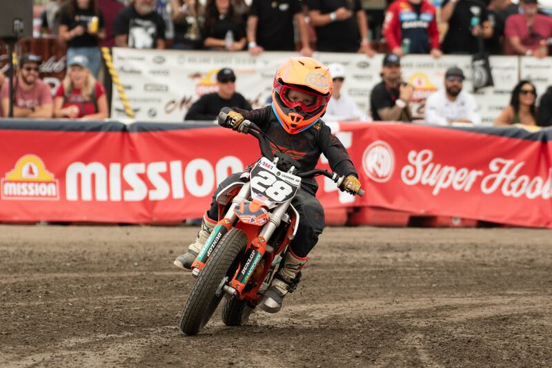 A child rides his bike in the STACYC Electric Kids Race, where children ride the same Super Hooligan course on scaled-down e-bikes. The race was one of many smaller competitions including the Amatuer Hooligan, Run What Ya Brung and Mad Dog Mini.