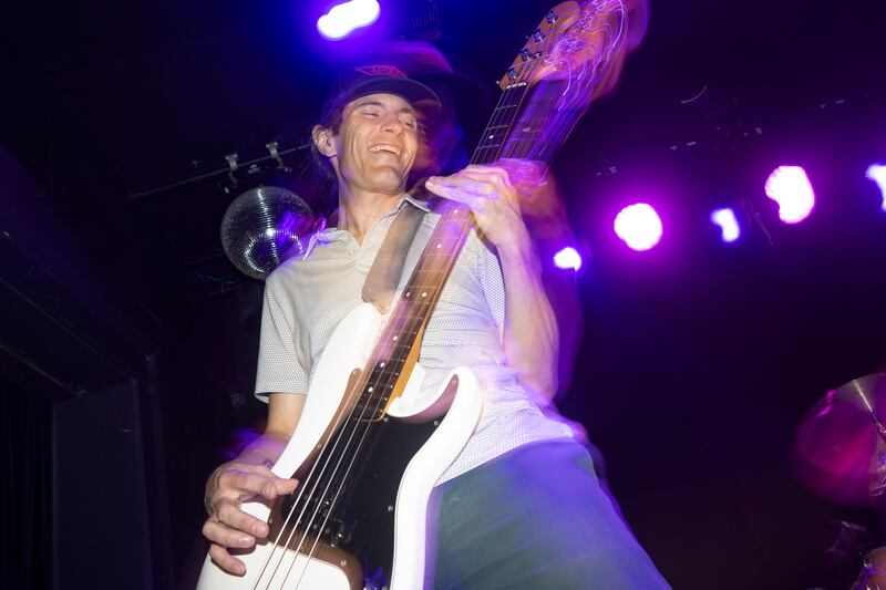 Bass player dancing