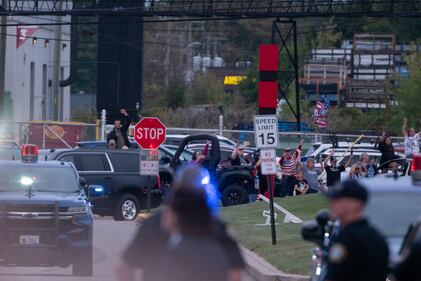 DESCRIBE THE IMAGE FOR ACCESSIBILITY, EXAMPLE: Photo of a chef putting red sauce onto an omelette.