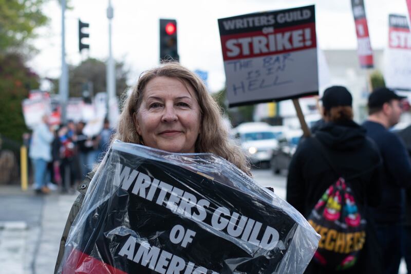 Vice President of WGAW, Michele Mulroney, stands with protesters at the CBS TV City location. It is one of 10 strike locations on the West Coast, one of 22 locations for demonstrations across the U.S. and is the same picket line that Mulroney walked for 100 days back in 2007 when the last strike occurred over the writer's role in the emergence of internet content.