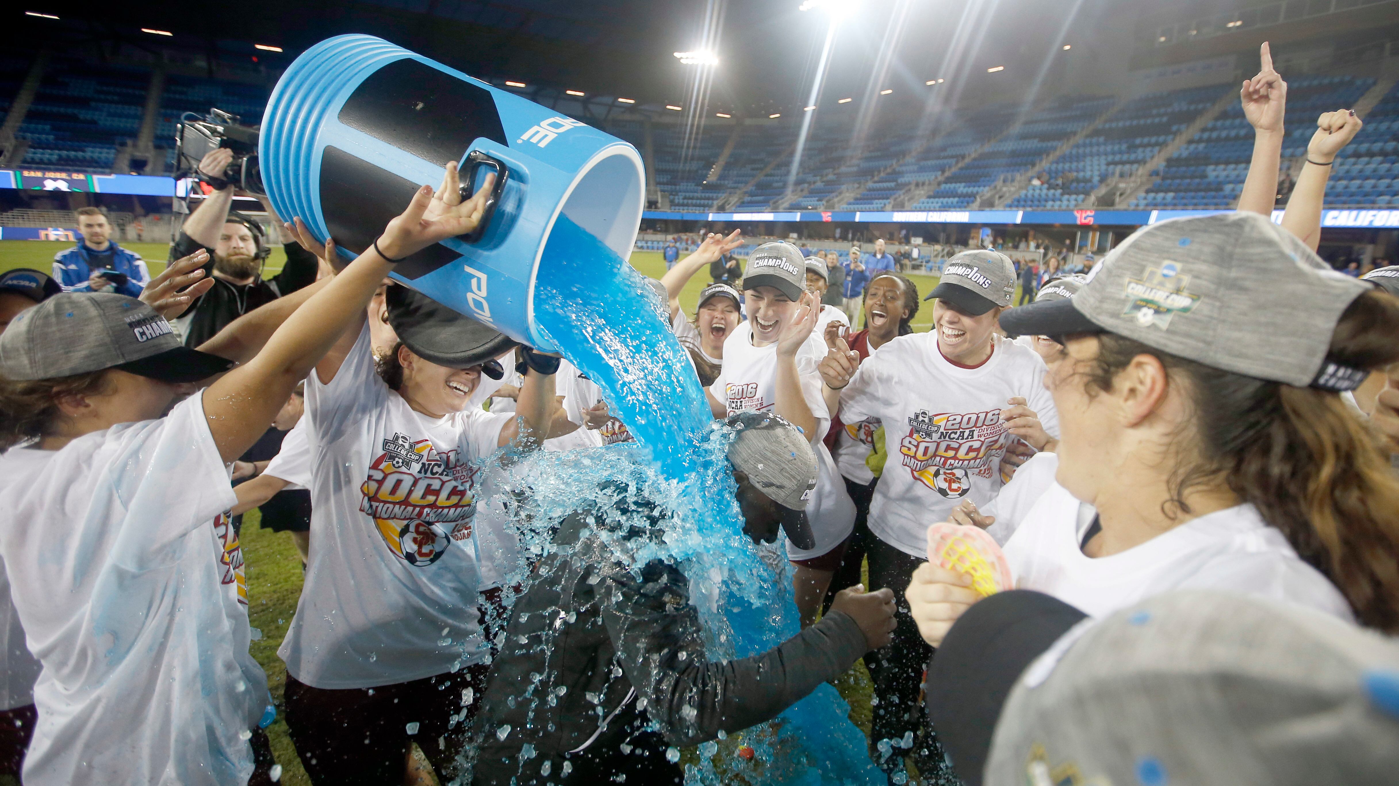 A photo of USC head coach Keidane McAlpine receiving a Gatorade shower.
