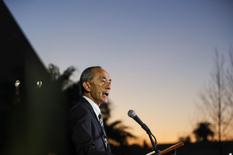 Photographs of a vigil outside the Monterey Park civic center held for the victims of the Monterey Park mass shooting.