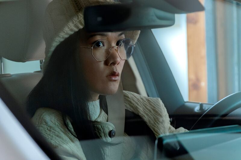 Still of a woman in a car