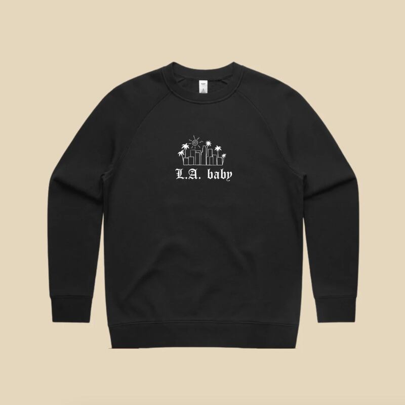 Photo of a black sweatshirt that says L.A. Baby.