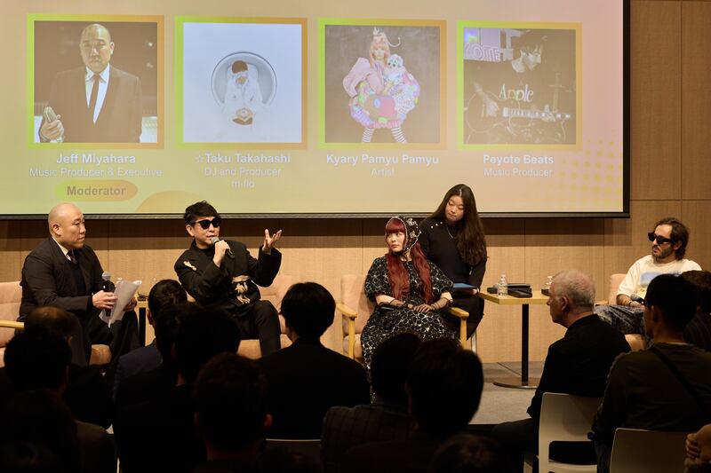 Artists talking at a panel