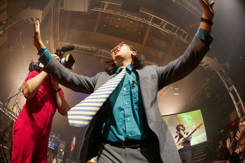 Guy waving his hands