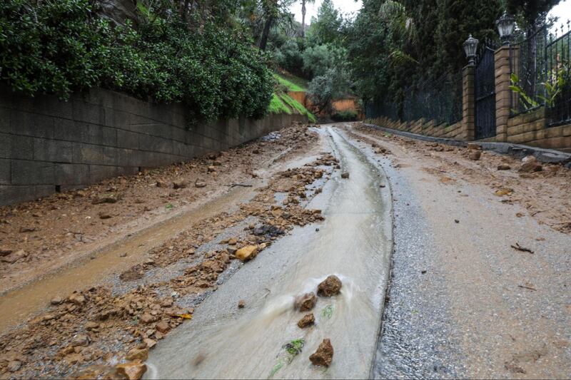 Photos by USC Annenberg Media photojournalists of landslides in Studio City caused by rainfall.