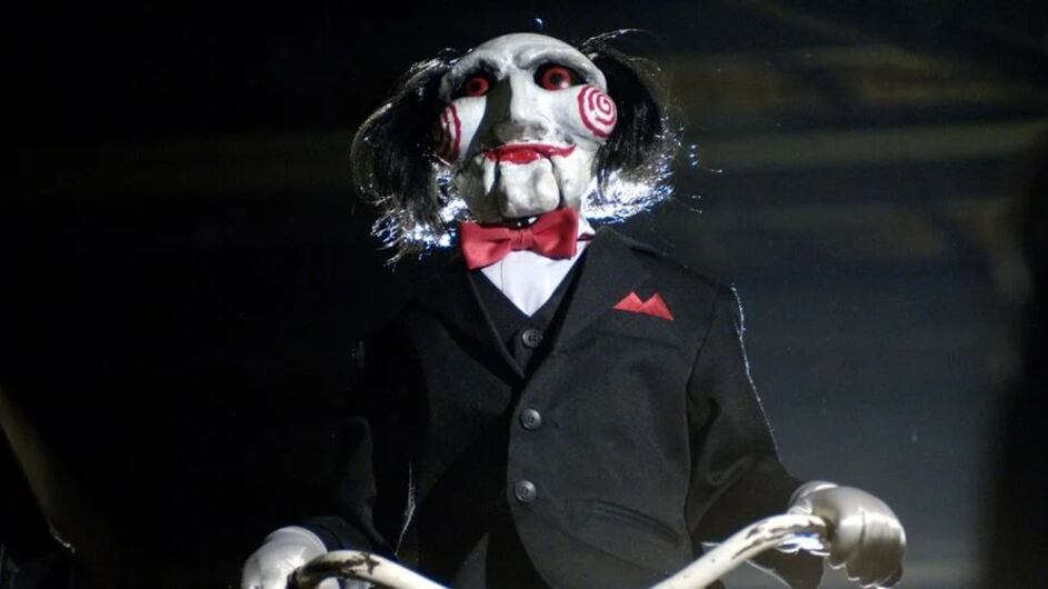 Jigsaw from the movie 'Saw' on a bike.