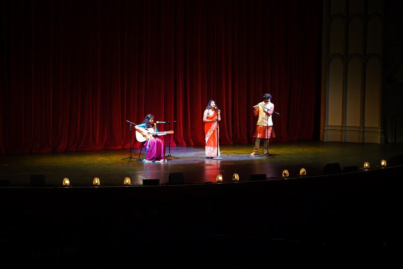 Rhea Anand, Anirudh Sreeram and Shreenidhi Hegde give a group musical performance. (Photo by Dua Anjum)