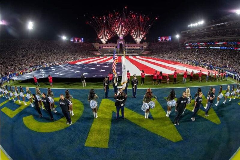 Photo of a National Anthem singing performance.