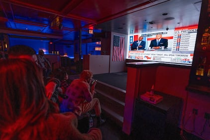 DESCRIBE THE IMAGE FOR ACCESSIBILITY, EXAMPLE: Photo of a chef putting red sauce onto an omelette.