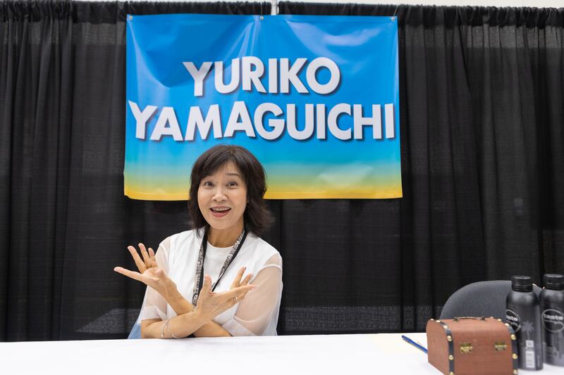 Yamaguchi at an autograph booth