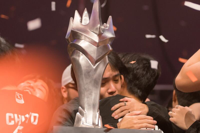 Yun “Rush” Hee-won, head coach of the Dallas Fuel, embraces Sp9rkle as the team celebrates the win. This is Rush’s first title after three seasons in the Overwatch League. He came close in 2021 after earning the Coach of the Year award that year but ultimately fell short with the Fuel in third. (Photo by Michael Chow)
