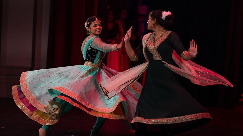 The Kathak dancers put on a colorful performance.