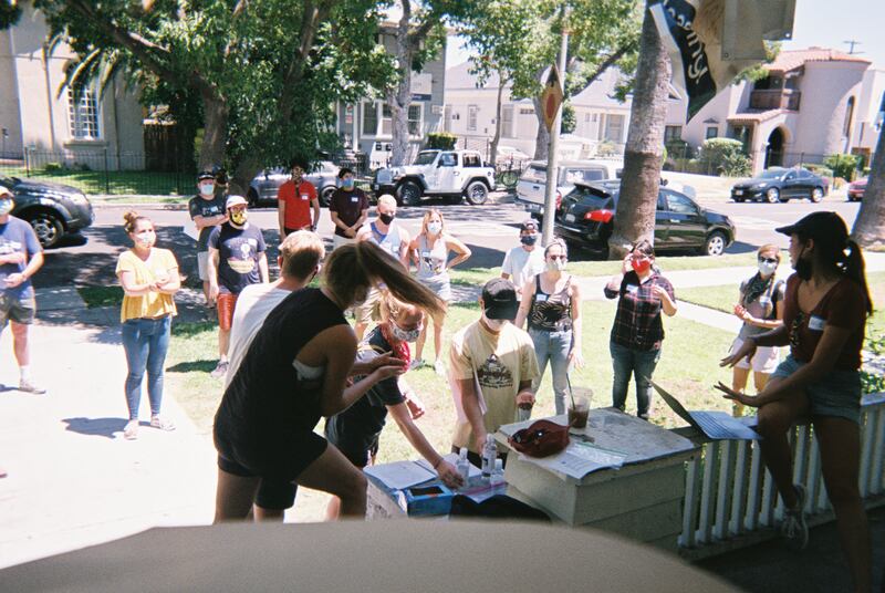 Volunteers assembled on a lawn