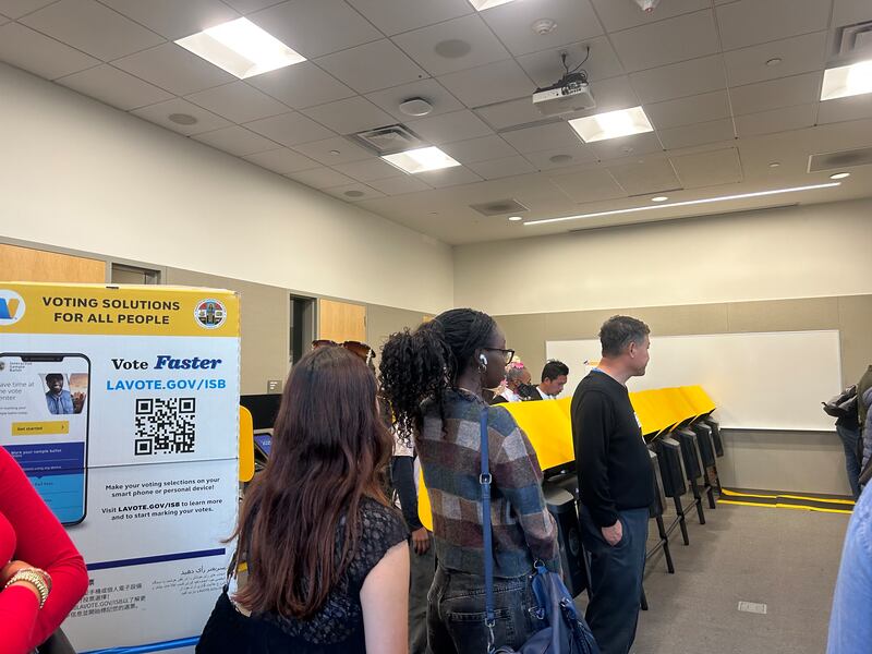 Students lined up inside the polling center on S Hoover Street just outside of the USC Village. (Photo by Luisa Tripoli)