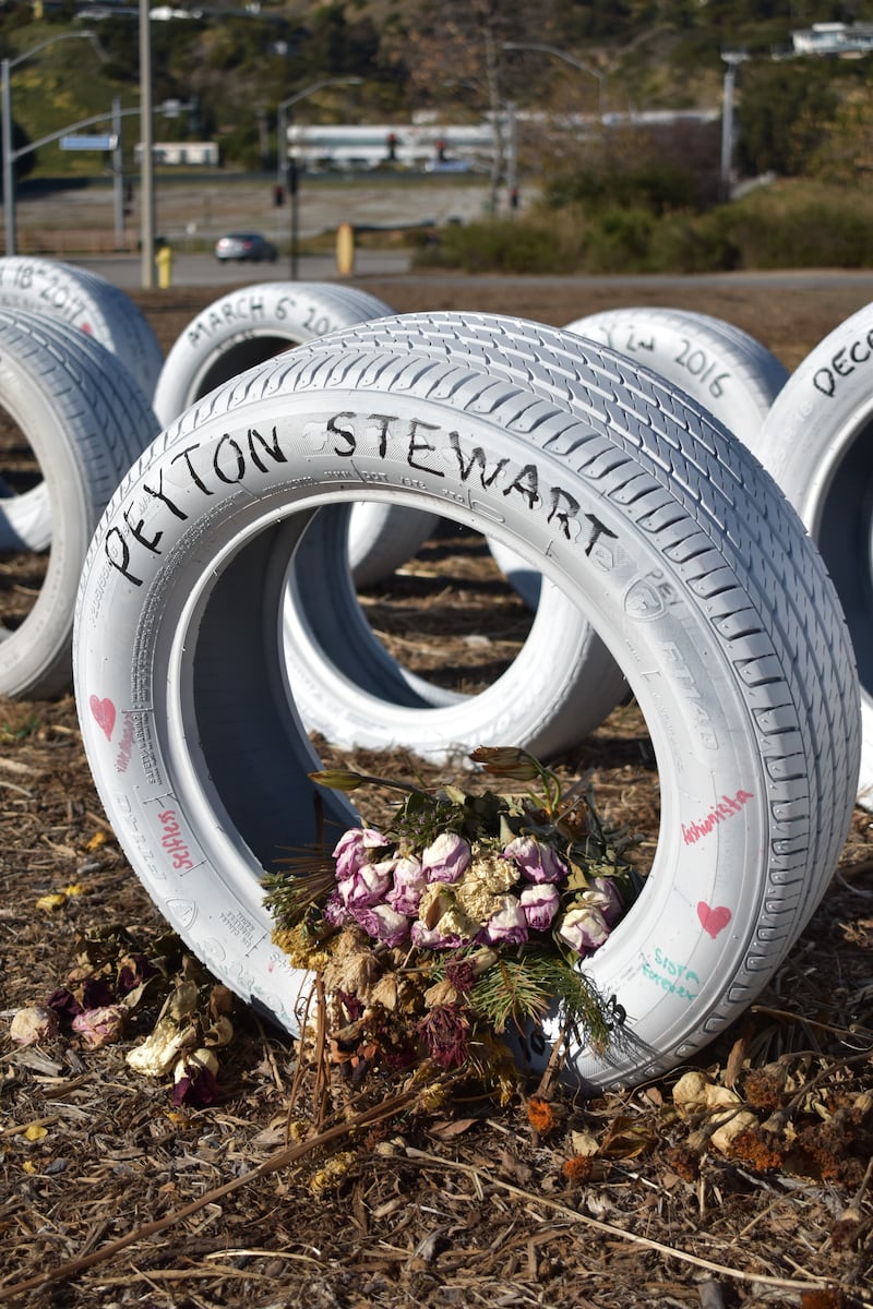 A tire on the side of Pacific Coast Highway pays tribute to Peyton Stewart. (Photo by Mary Elisabeth)