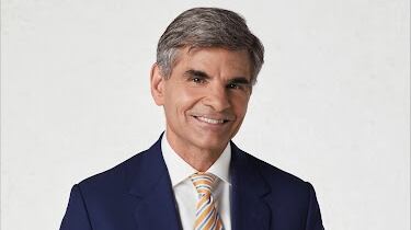 Headshot of George Stephanopolous in a suit.