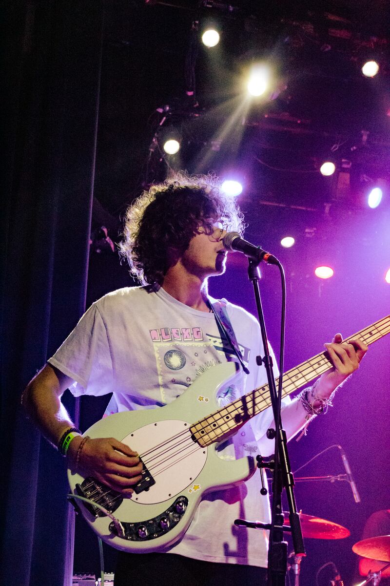 Bassist Griffin Meehan sings during a performance of Frat Mouse's hit single, "Grant Wasserstien." (Photo by Marissa Ding)