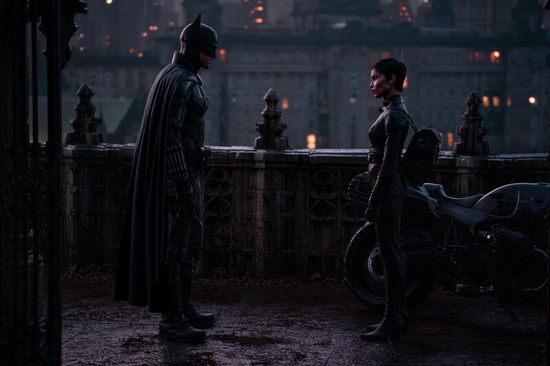 A still shot from "The Batman" featuring Zoë Kravitz and Robert Pattinson.