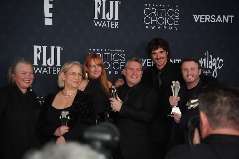 Photo of Jacob Elordi and production, costume and makeup team of "Frankenstein." Left to right: Kate Hawley (Costume Design), Tamara Deverell (Production Design), Cliona Furey (Hair Department Head), Jordan Samuel (Make-up), Jacob Elordi (The Creature) and Mike Hill (Make-up).
